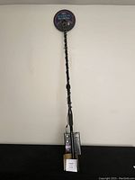 Full view of White's Blue Max 800 metal detector standing upright, showing the coil, shaft, and control boxes.