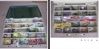 Open view of two-section tackle box with compartments filled with assorted fishing lures and tackle including soft plastic baits, hard-bodied lures, hooks, and weights.