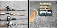 Photo showing three fishing rods with reels placed on pavement and an open tackle box with fishing gear inside.