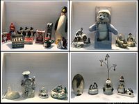 Wide view showing assorted functional and decorative penguin and winter-themed items, including shakers, figurines and candle holders.