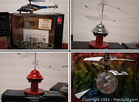 Four helicopter and drone toys displayed including one in box, red and silver dome helicopters, and clear drone