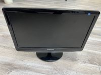 Front view of Samsung monitor showing screen and brand logo on bezel