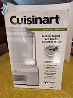 Box front showing Cuisinart Ice Cream Maker model ICE-21C and features including frozen yogurt, ice cream, sorbet maker, BPA free, double insulated freezer bowl, 3-year warranty