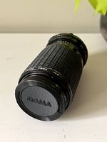 Front view of the Sigma lens with front lens cap on.