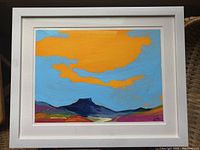 Front view of the framed painting showing the full composition and white frame