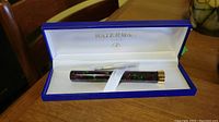 Opened Waterman box showing pen in white satin liner