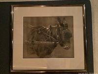 Entire artwork showing the framed charcoal painting of the working horse or mule.