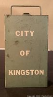 Front of metal first aid kit box labeled 'City of Kingston'