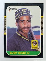 Front side of Barry Bonds 1987 Donruss rookie baseball card showing player portrait and team logos.