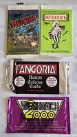 Photo showing all four unopened vintage trading card packs arranged in two rows: Vietnam, Beetlejuice, Fangoria Horror Collector Cards, and Deathwatch 2000 packs.