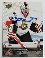 Front of Matt O'Connor Young Guns rookie card showing player in Ottawa Senators goalie gear and autograph in blue ink.