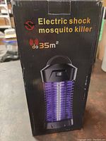 Box front showing image of the bug zapper unit and coverage area up to 35 square meters