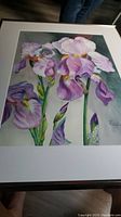 Framed watercolor painting of iris flowers, full view