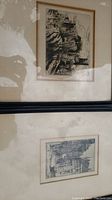 Two framed ink etchings displayed one above the other with Robert Simpson framing.