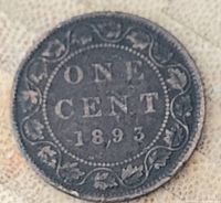 Reverse side of Canadian penny dated 1893 showing denomination and maple leaf wreath