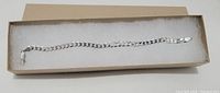 Sterling silver curb chain bracelet in box, 7 inches long