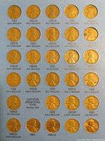 Full lot showing 29 USA one cent coins from 1951 to 1962 with mint marks and mint production numbers.