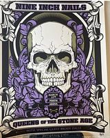 Full view of the Nine Inch Nails concert print featuring a skull surrounded by purple flowers with concert details.