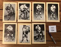 Full lot view showing 7 vintage black and white Beehive photos of Chicago Blackhawks players from 1944
