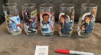 Full view of all 5 Empire Strikes Back glasses arranged in a row showing colorful character artwork with none having chips or cracks.