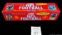 Closed red box showing 1990 Score NFL Football branding and card count of 665 plus 5 bonus cards.