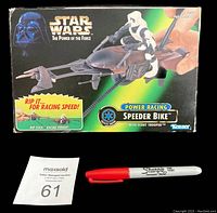 Front view of unopened Star Wars Power Racing Speeder Bike box featuring Scout Trooper figure and branding.