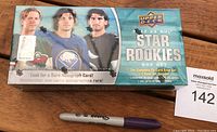 Front view of sealed 2022-23 Upper Deck NHL Star Rookies box showing rookie player images and Upper Deck branding.