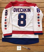 Back view of the jersey showing OVECHKIN nameplate and number 8 with stars design on sleeves.
