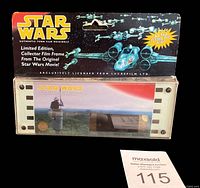 Photo of the sealed limited edition Star Wars 70 mm film frame package showing front label and film frame inside plastic holder.
