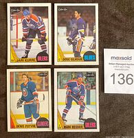 Four individual cards displayed front side showing player in uniform: Jari Kurri (Oilers), Doug Gilmour (Blues), Denis Potvin (Islanders), Mark Messier (Oilers), highlighting card design and condition.