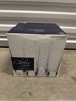 Box packaging showing the brand Mikasa, set of four glasses, made of fine European lead-free crystal.