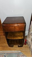 Full view of the vintage Gibbard night stand showing the drawer, shelf, and bottom compartment.
