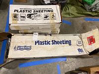 Box of plastic sheeting with FilmGard branding and size label 20 x 100 feet.