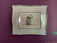 Framed print of elephant cartoon with red heart and speech bubble saying 'Horton Hears You','10x12 inch size tag on wall
