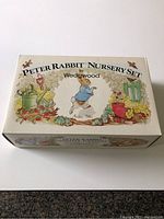 Box top of the nursery set showing Peter Rabbit artwork and title.