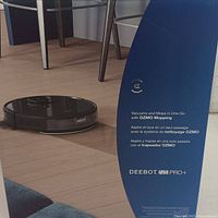 Exterior of DEEBOT N8 PRO+ packaging showing marketing text and product image