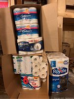 Boxes showing Cashmere and Royale toilet paper packs with multiple rolls, and a pack of Royale Original 60 rolls toilet paper.