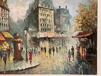 Close-up view of central portion showing buildings, figures and street