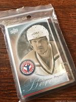 Close-up of Mario Lemieux Upper Deck hockey card in protective sleeve