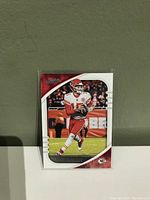 Front of a Patrick Mahomes football card featuring him in the Kansas City Chiefs uniform.