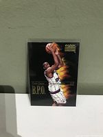Front of Vince Carter Toronto Raptors basketball card showing player mid-action with ball.