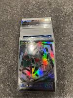 Stack of NBA cards shown with a holographic Tim Hardaway Jr. card on top