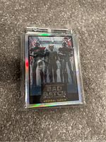 Close-up of a Star Wars The Bad Batch trading card showing Admiral Tarkin and two soldiers, holographic finish, individually sleeved.