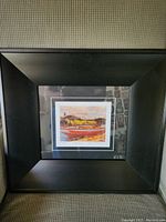 Framed full view of the print in a black wide frame and white matting showing the overall presentation of the artwork.