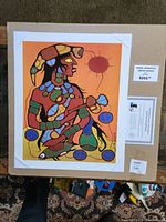 Norval Morrisseau limited edition print on cardboard backing with certificate of authenticity and price label.