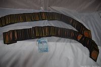 Long rows of Magic cards face down and one face-up foil card