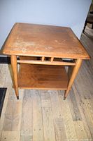 Front and top view of Lane MCM Danish solid wood table showing square top and lower shelf with tapered legs and metal foot caps
