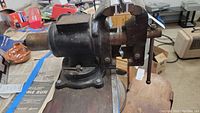 Alltrade heavy duty vise showing side and rotating base with bolts and wear