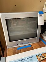 Front view of the Magnavox CRT TV showing the screen and input jacks on lower front.