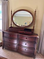 Front view of dresser and mirror showing overall design